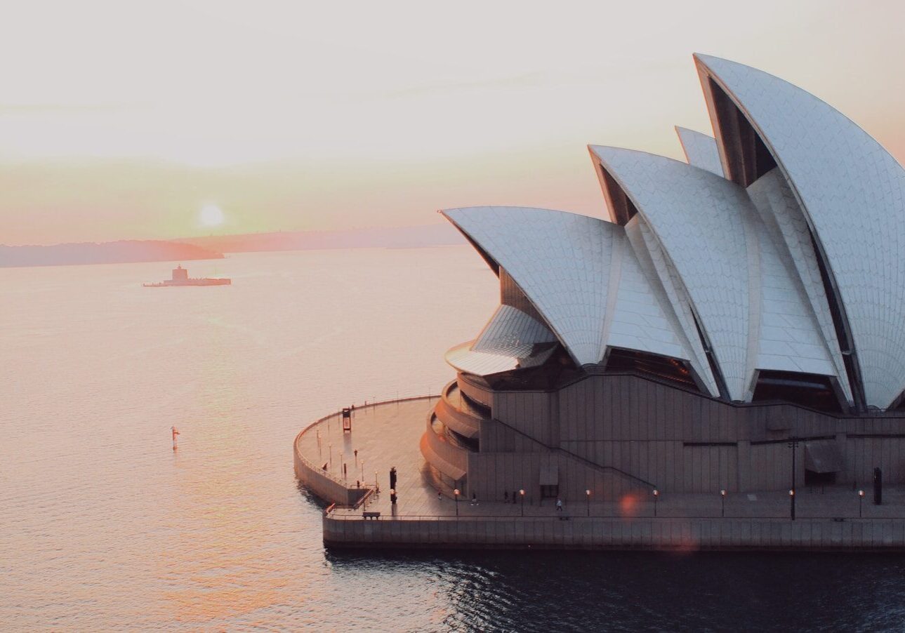 the sydney opera house in the middle of a body of water